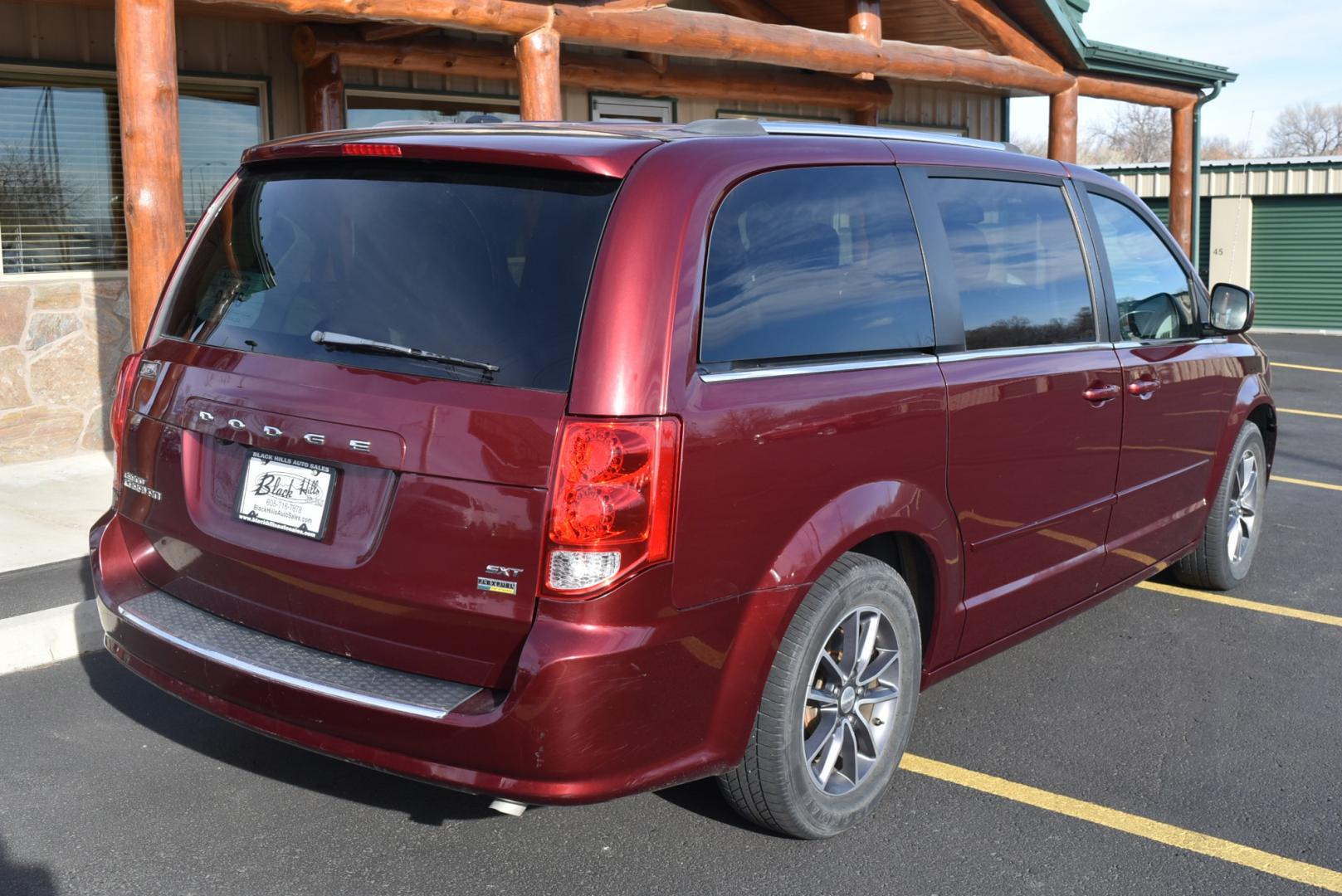 2017 Maroon /Black Dodge Grand Caravan SXT (2C4RDGCGXHR) with an 3.6L V-6 VVT 24 Valve Flex Fuel engine, 6-Speed Automatic transmission, located at 1600 E Hwy 44, Rapid City, SD, 57703, (605) 716-7878, 44.070232, -103.171410 - Photo#7